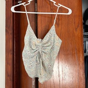 Willow and root cropped tank top
